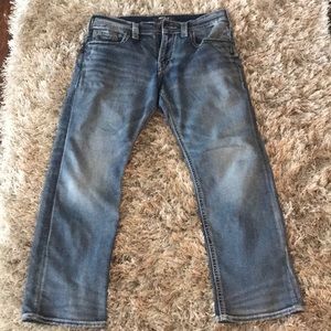 Men’s Silver boot cut jeans.